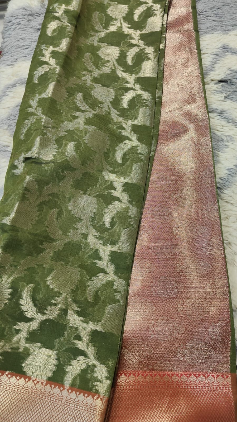 Beautiful banarasi organza silk saree with golden zari and red pallu.